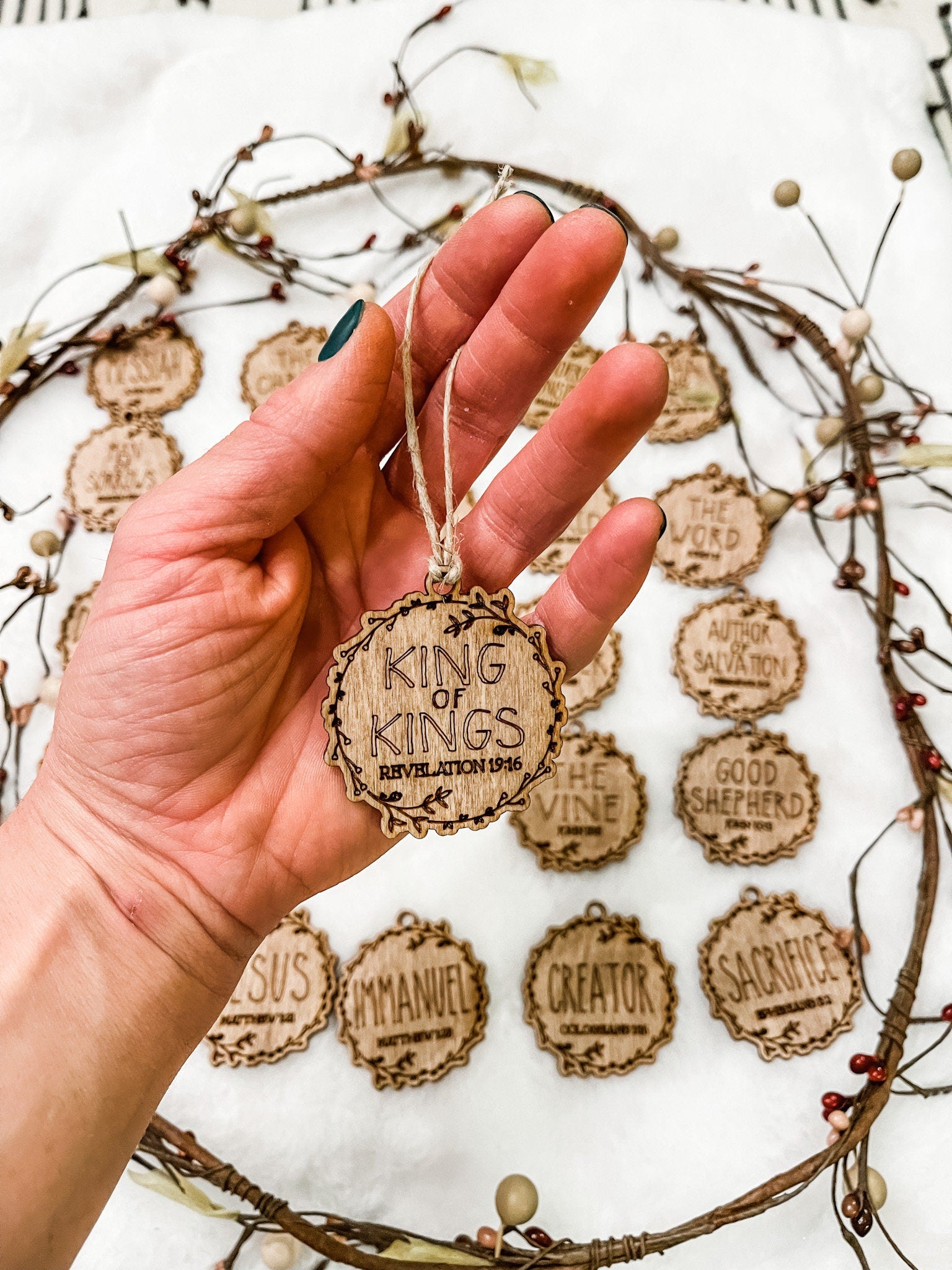 Laser engraved Christmas ornaments with 25 Names of Jesus on wooden design
